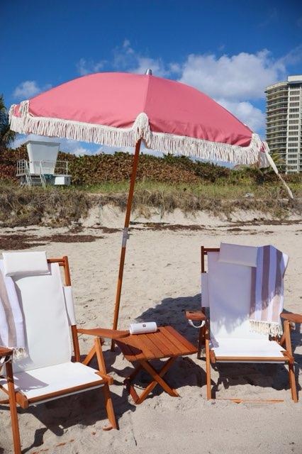 Beach umbrella setup on white sand